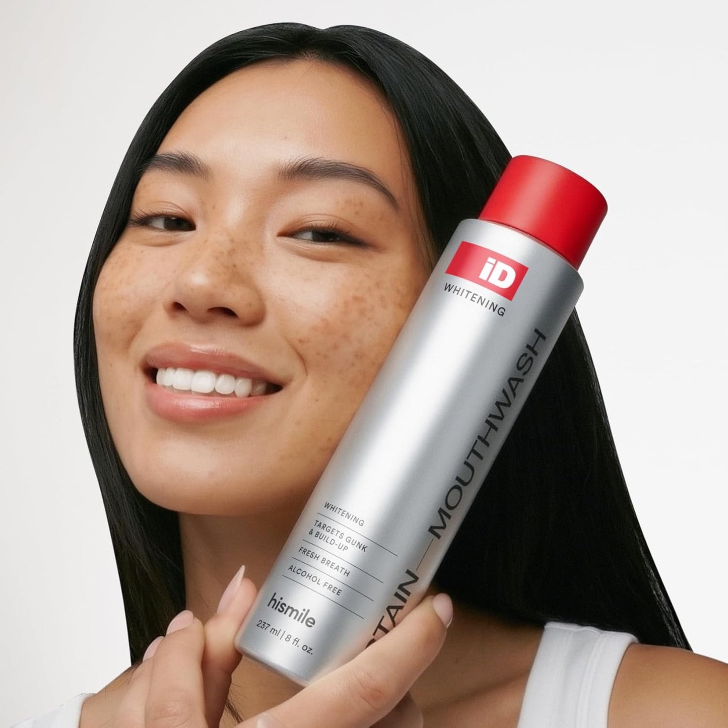 adult-formulated oral care liquid designed as an add-on to brushing and flossing