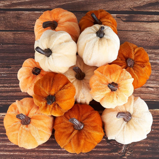 12-piece artificial pumpkin set in two sizes (2.7"h x 2.1"d and 2.7"h x 2.55"d)