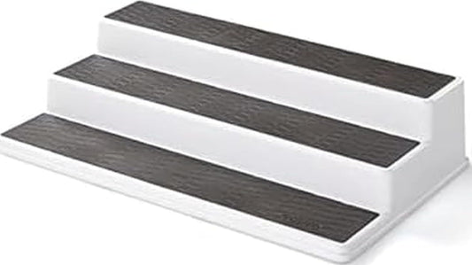 3-tier staggered step-shelf design that creates a visual staircase effect for visibility