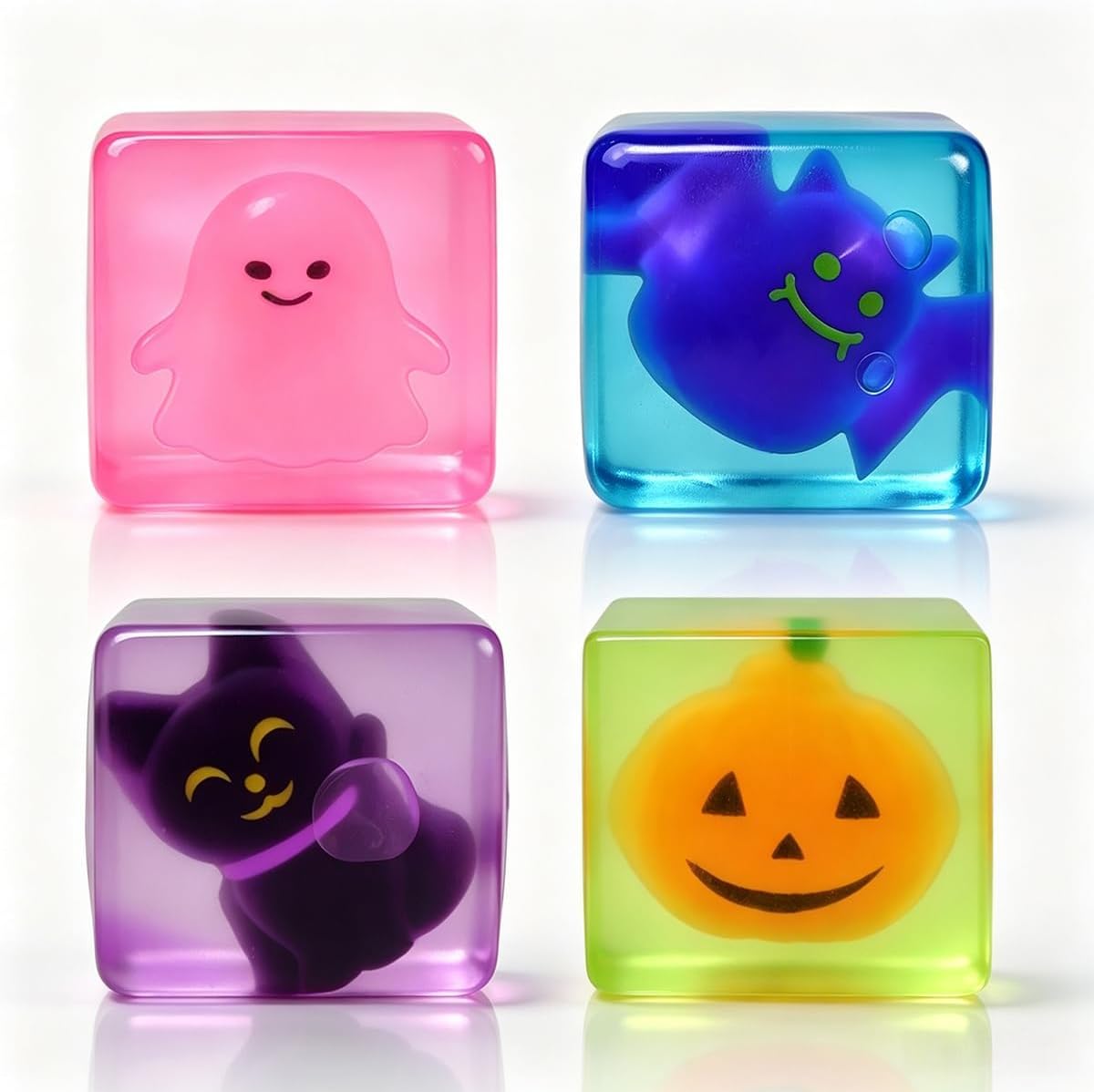 4-pack set with four distinct halloween-themed inner squishies: bat, ghost, pumpkin, black cat