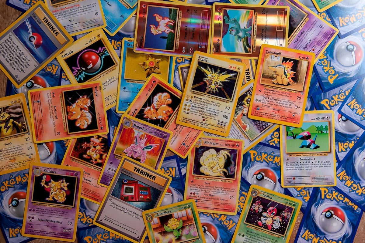 50 assorted pokemon cards from the 2022 set lineup