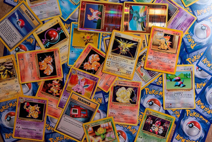 50 assorted pokemon cards from the 2022 set lineup
