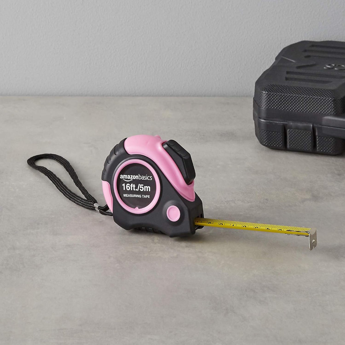 Amazon Basics Retractable Tape Measure with Metric and SAE Measurements, 16ft/5m – Simple Dual-Scale Measuring Tool for Intentional, Less-Is-More Workspaces, Pink