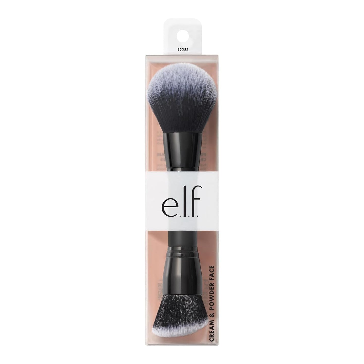 angled buffing brush head shaped to hug facial contours for seamless cream blending