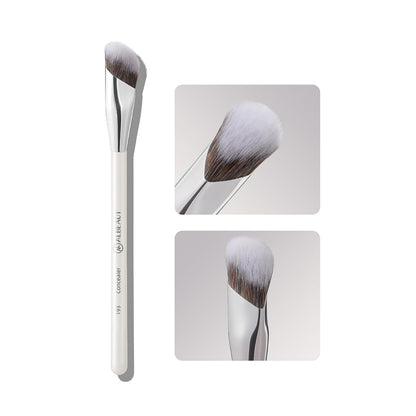 angled, sculpted synthetic nylon bristle head designed for under-eye and nose contours