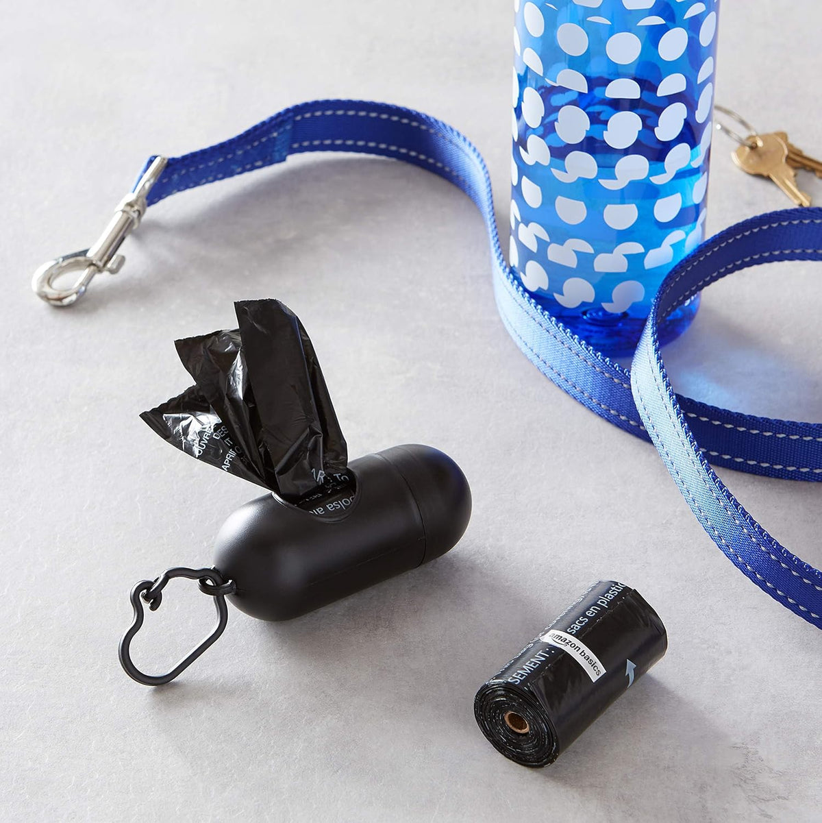 carabiner clip for attaching dispenser directly to a leash or belt loop