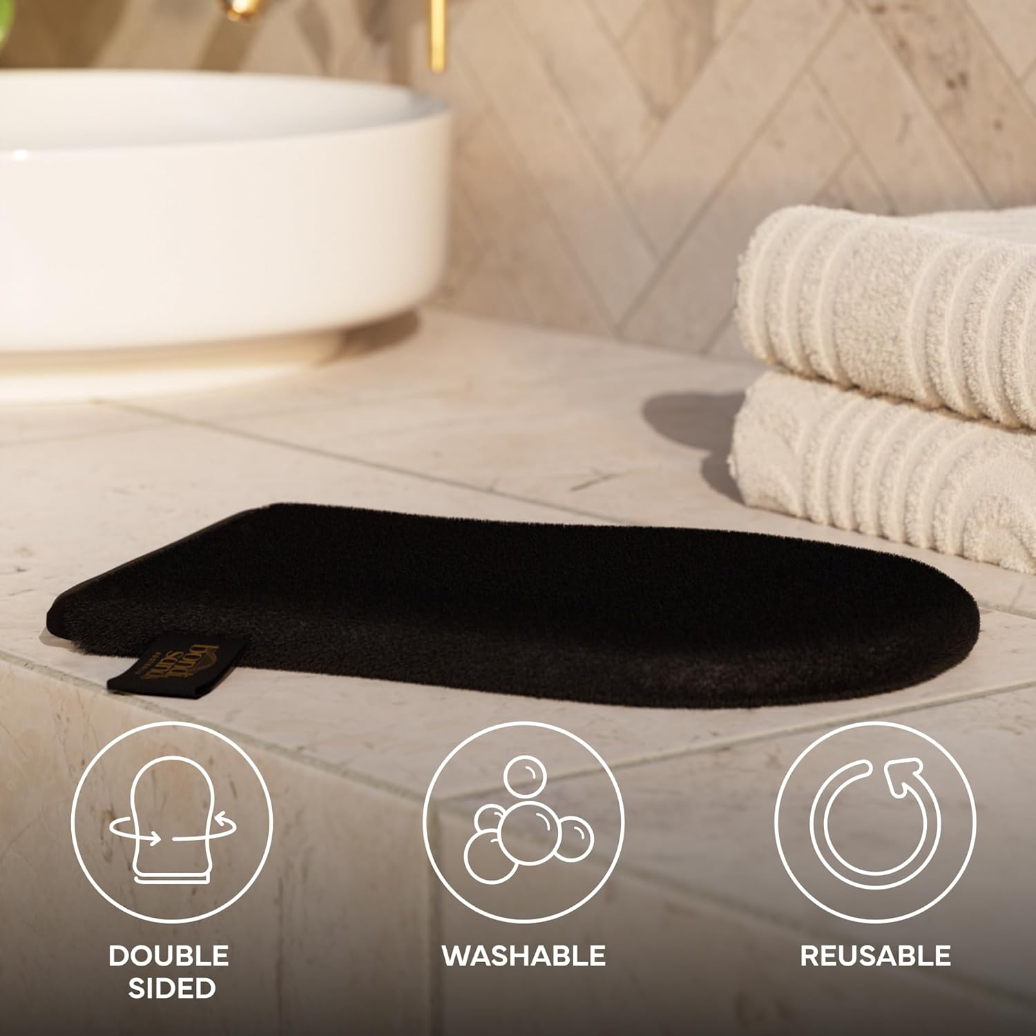 dedicated plain side for loading self-tan product to prevent waste on hands