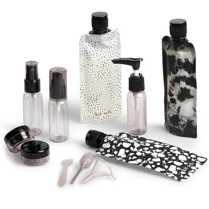 eleven-piece set including spray bottle, pump bottles, mini jars, flat pouches, and a 1qt travel pouch