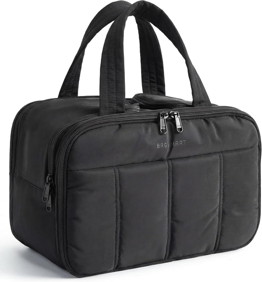 four-compartment layout with two mesh pockets, an elastic brush holder, and a transparent small-item pocket
