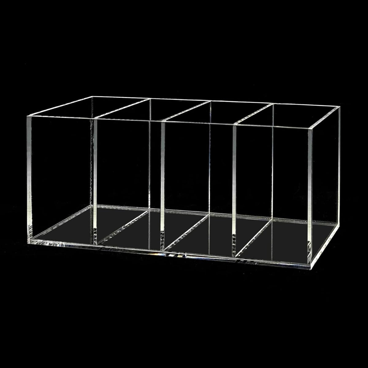 four divided compartments for separated storage of pens, brushes, or cutlery