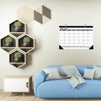 full-year monthly reference calendar printed on every page plus days-elapsed/remaining counters