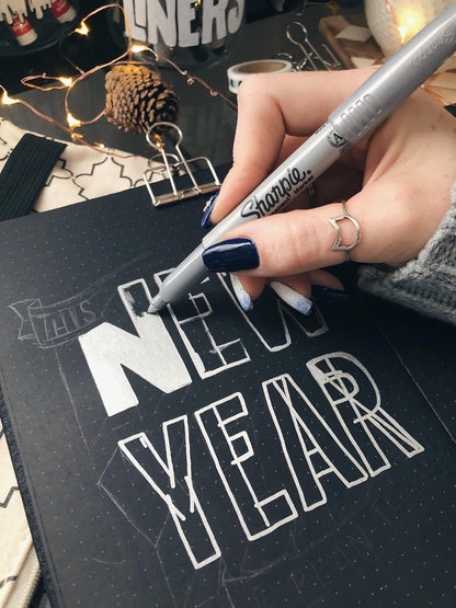 metallic silver permanent ink with opaque, shimmering finish