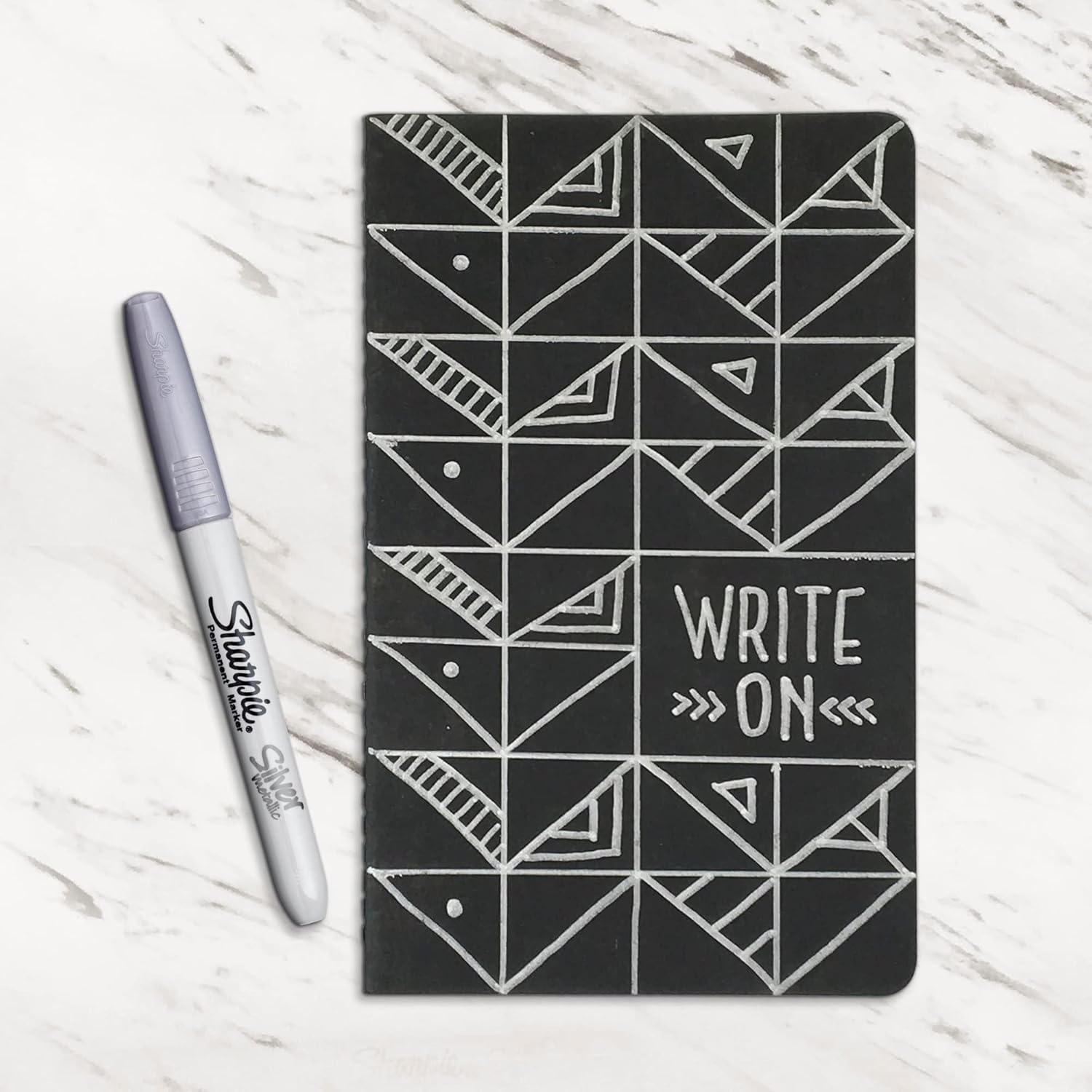 opaque metallic silver ink formulated for dark surfaces