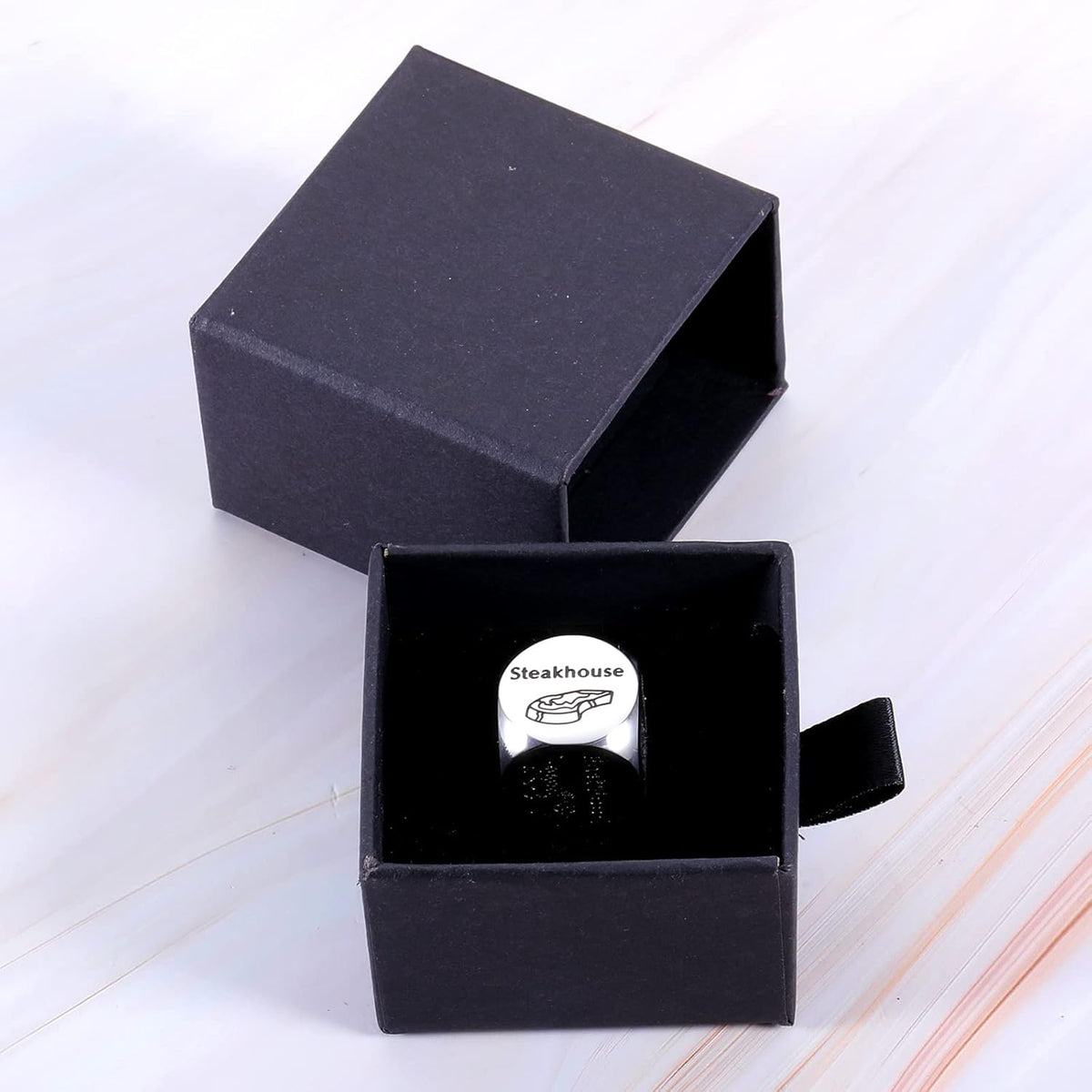pack of 2 dice per purchase, allowing couples to each roll simultaneously