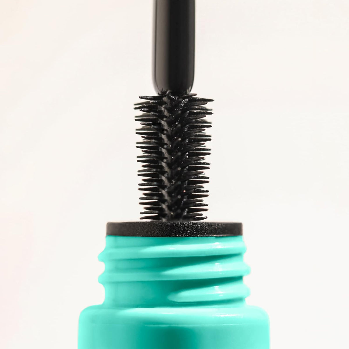precise brush wand designed to coat, define, and lengthen from root to tip