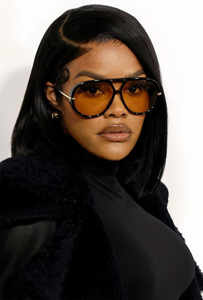 retro 70s-inspired silhouette with a large, face-framing profile