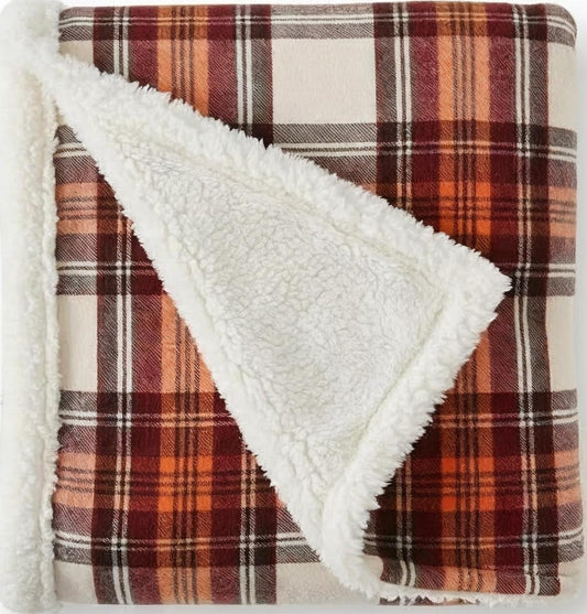 reversible two-sided construction: brushed fleece face and plush sherpa reverse
