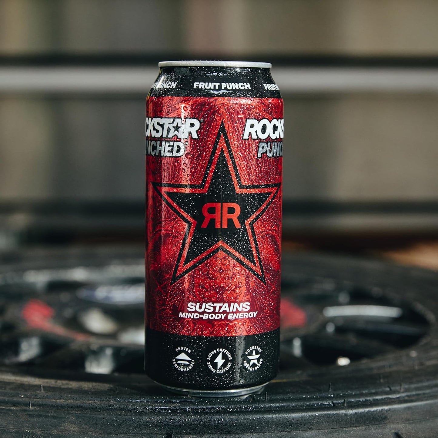 Rockstar Tropical Energy Drink – Portable 12oz Cans for Camping Coolers, Road Trip Dashboards, and Hike Trailheads