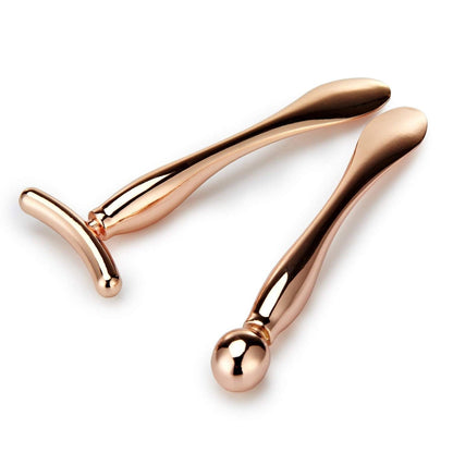 two-piece set: round eye cream applicator plus y-shaped massage wand